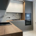 Cabinet furniture for kitchen No. 1122 painted MDF facades Antratsit Gray and matt white with Soft Touch effect 