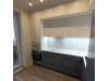 Мебель корпусная для кухни № 1155 крашеные МДФ фасады с  эффектом Super глянец и интегрированной ручкой 