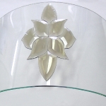 Curved glass with beveled elements
